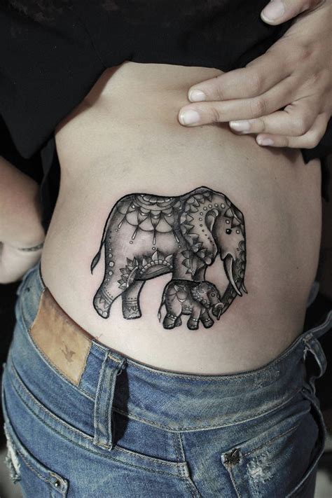 feminine elephant tattoos